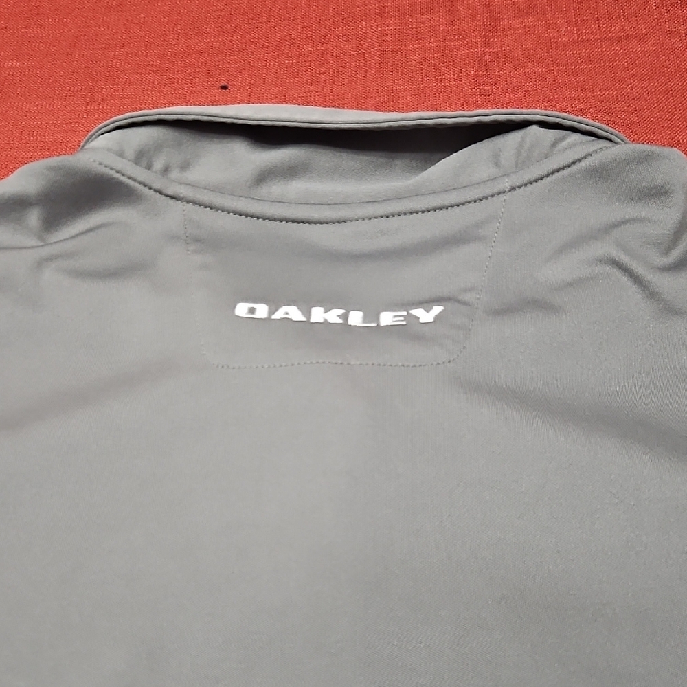 3/$35 Oakley Gray Polo Shirt with Striped Design - Picture 3 of 5